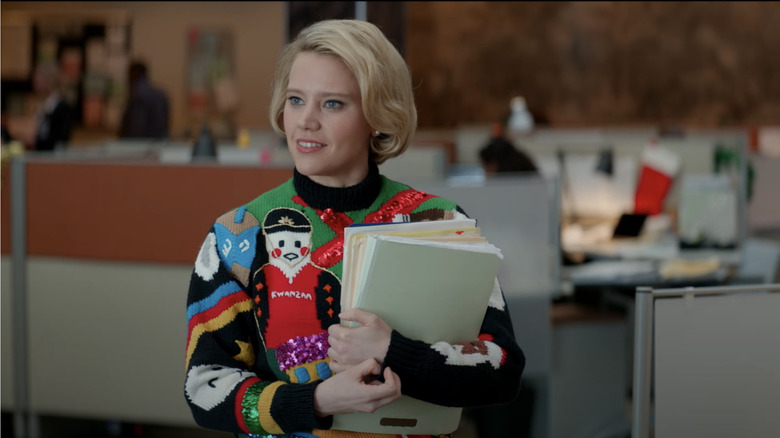 Kate McKinnon wears a sweater in "Office Christmas Party"