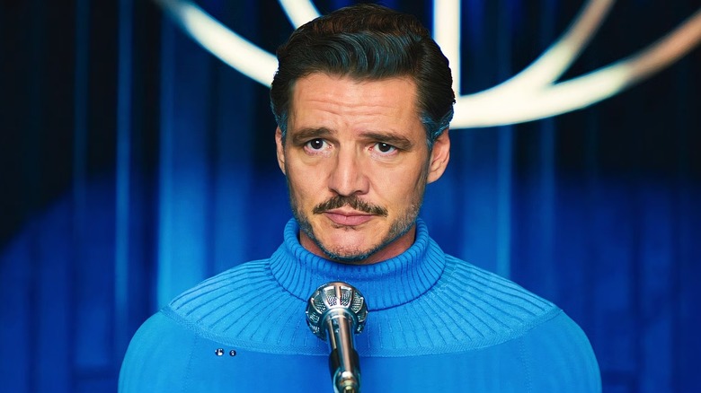 Reed Richards in front of a microphone in 