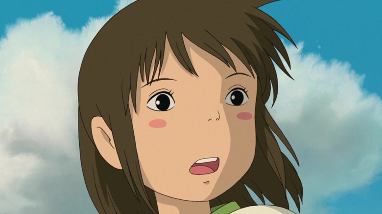 Chihiro's face against blue sky
