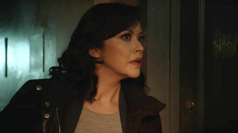 Marisa Ramirez searching a house