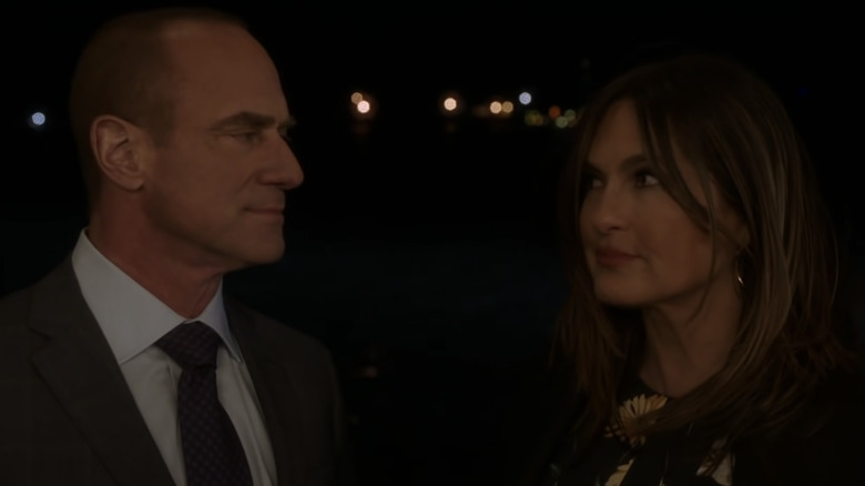 Elliott Stabler (Christopher Meloni) and Olivia Benson (Mariska Hargitay) attending a party in "Law and Order: SVU"