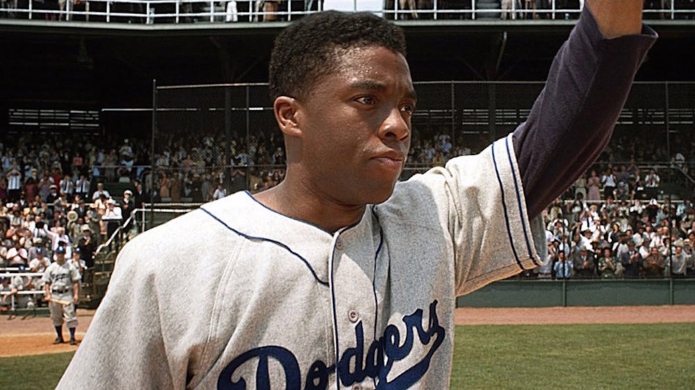 Chadwick Boseman as Jackie Robinson in 42