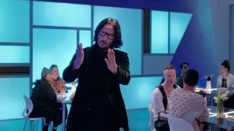 Keanu Reeves greets