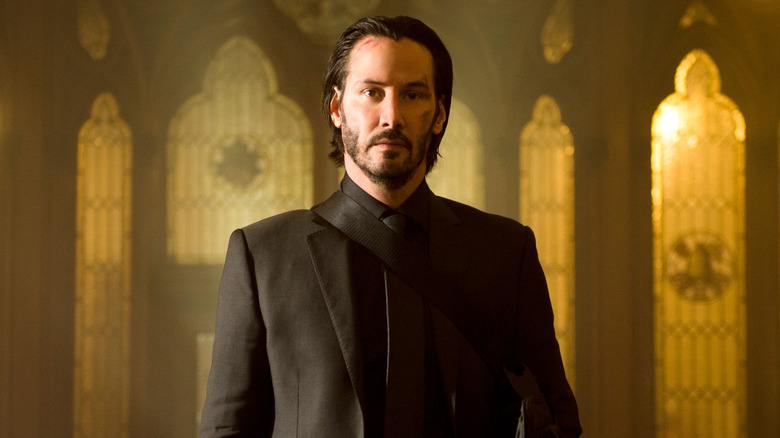 John Wick standing in a church (2014)