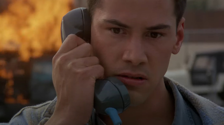 Jack Traven on phone