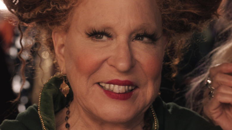 Bette Midler grinning devilishly