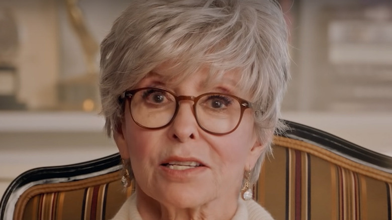 Rita Moreno wearing brown glasses