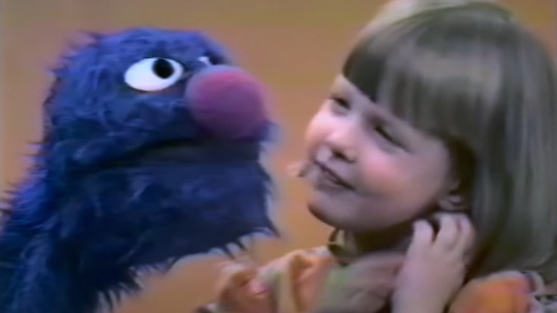 Little girl with Grover