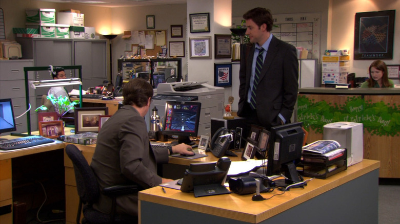 Dwight sitting at megadesk