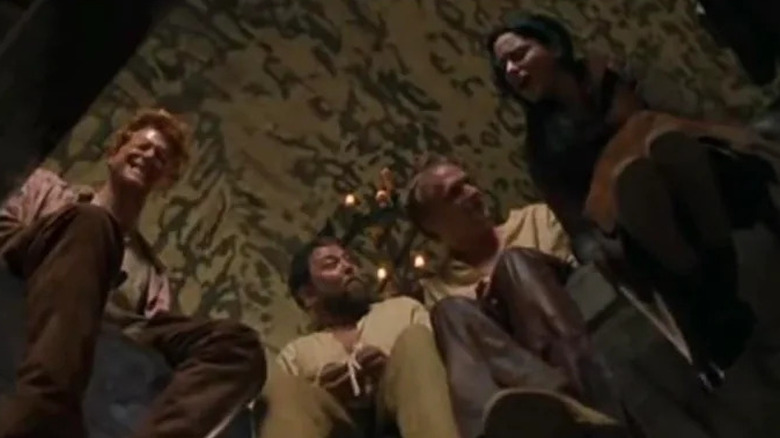 Wat (Alan Tudyk), Roland (Mark Addy), Geoffrey (Paul Bettany), Kate (Laura Fraser) sitting in the attic of a tavern