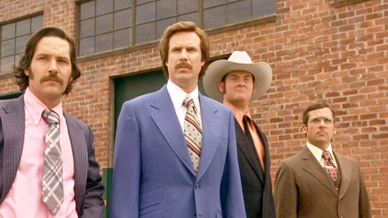 Brian, Ron, Champ, and Brick watch something in the distance in "Anchorman" (2004)