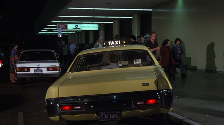 The taxi sits waiting in "Airplane!" (1980)