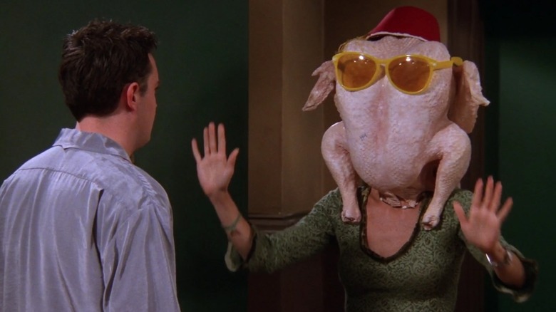 Monica with turkey on head