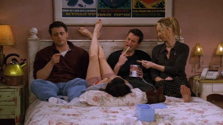 The friends eating wax