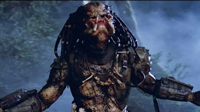 Predator in Predator The alien is invisible for much of the movie, which makes it all the more scary when we finally see the Predator in its physical form. To have a final battle with Arnold, he removes his mask and reveals a truly grotesque alien face with snarling external teeth that moved at his commands.