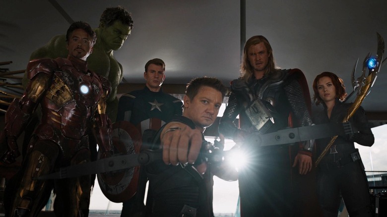 The Avengers stand over the camera
