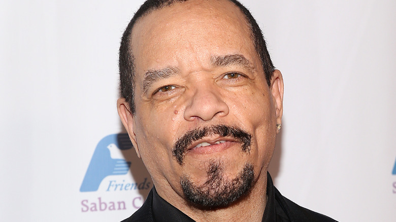 Ice T smirking