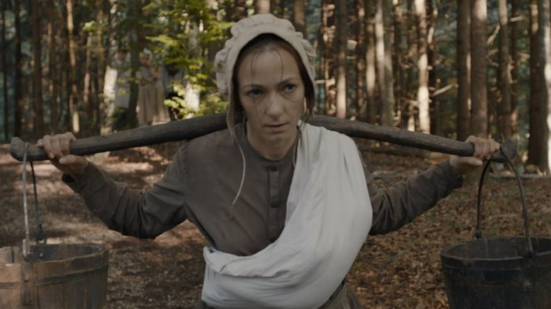 Hagazussa woman carrying water