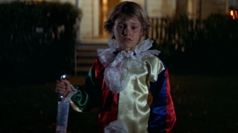 Kid Michael Myers holds knife