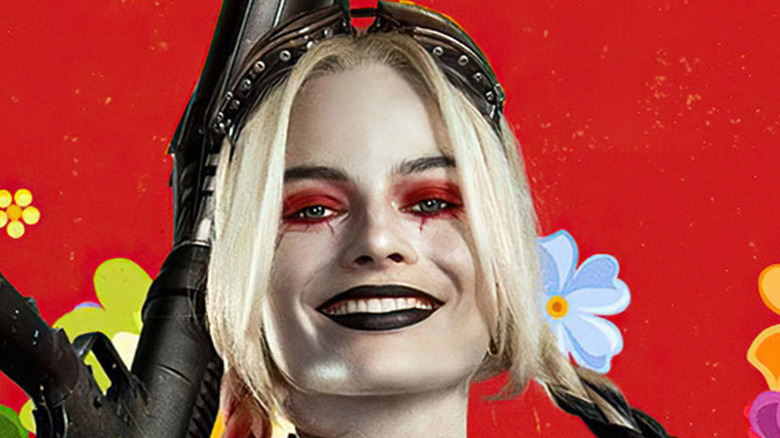 Harley Quinn smiling red background