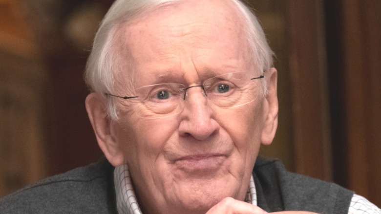 Len Cariou folding his hands