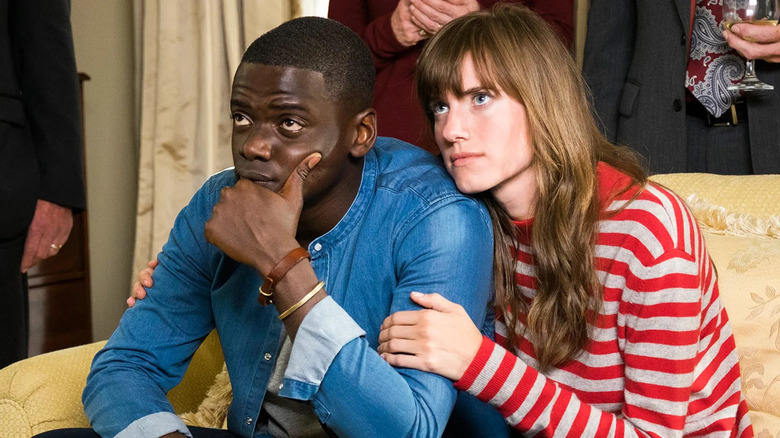 Rose leans against Chris on couch