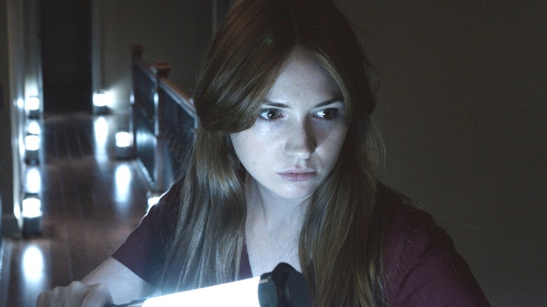 Karen Gillan with a lamp