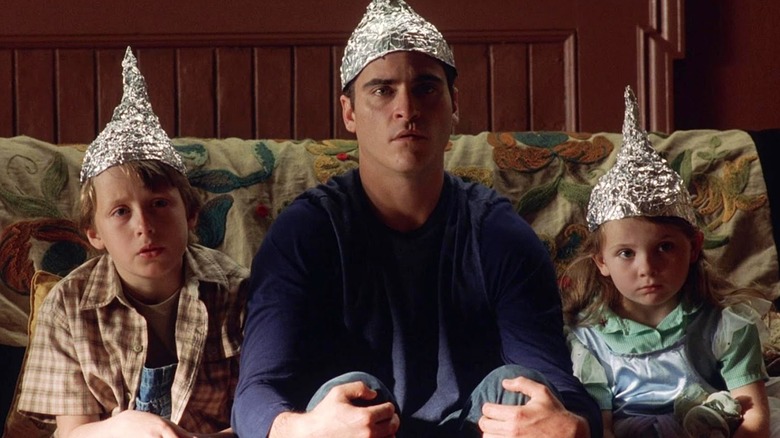 Joaquin Phoenix wearing tinfoil hat