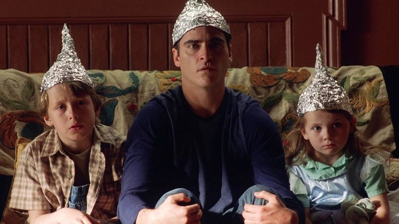 Joaquin Phoenix wearing tinfoil hat