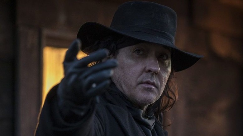 John Cusack reaching out