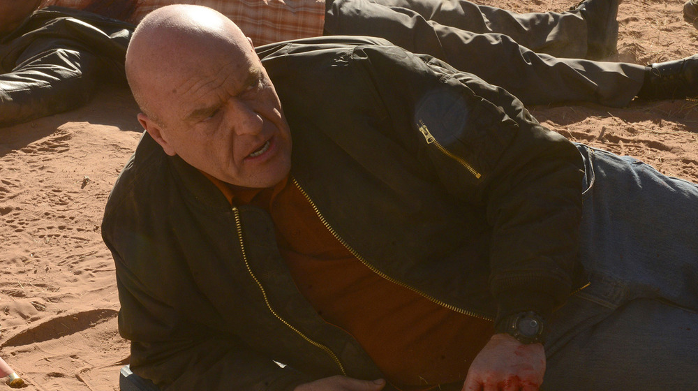 Hank Schrader (Dean Norris) lays beside his deceased partner Gomez (Steven Michael Quesada) in a scene from Breaking Bad