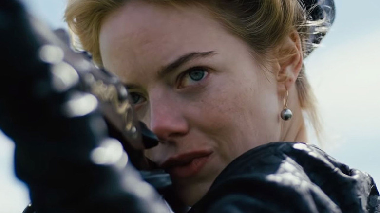 Emma Stone prepares to fire