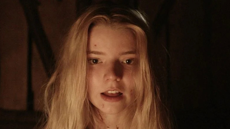 Thomasin mouth open bloody neck