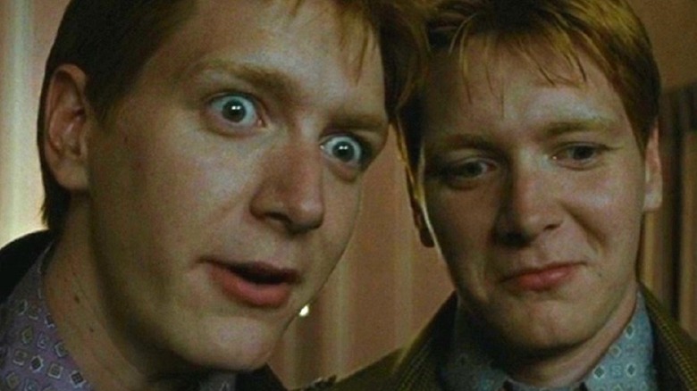 Fred and George Weasley smiling