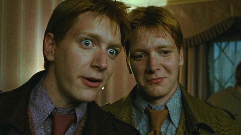 Fred and George Weasley smiling