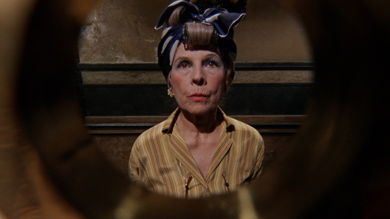 Women standing in peephole