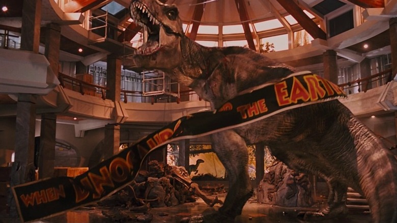 A loose tyrannosaurus rex causing destruction and mayhem to the indoor portion of Jurassic Park