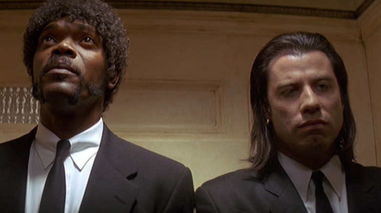 Partner hitmen Jules (Samuel L. Jackson) and Vincent (John Travolta) riding the elevator together
