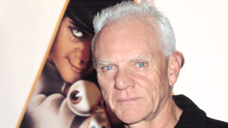 McDowell in front of A Clockwork Orange poster