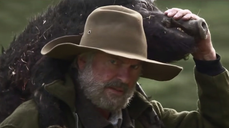 Sam Neill with boar