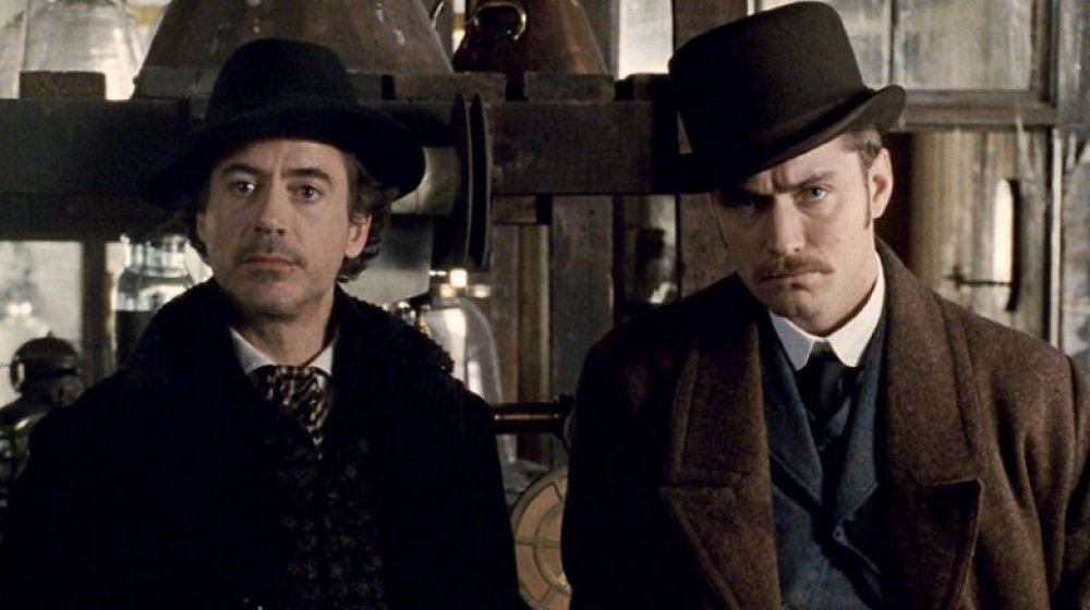 Robert Downey Jr. as Sherlock Holmes and Jude Law as Dr. John Watson in Sherlock Holmes