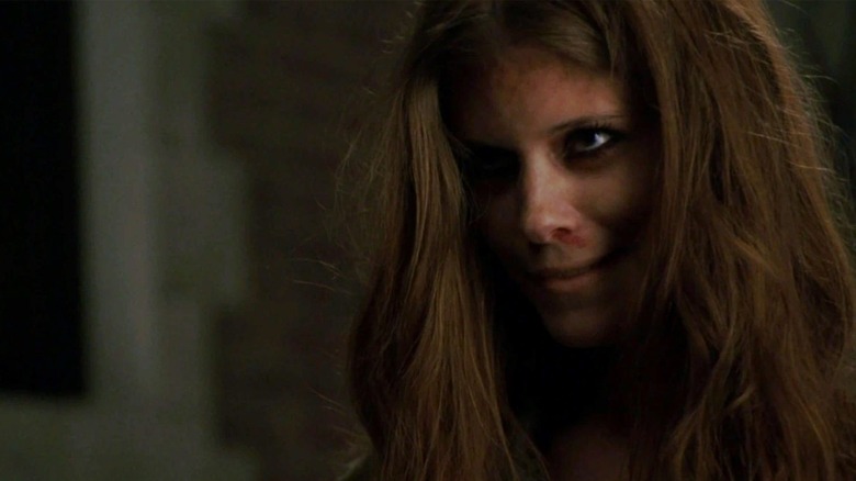 Kate Mara smirking in Murder House