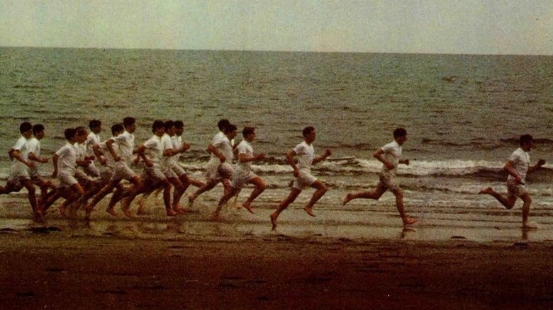 Men running on beach in Chariots of Fire 