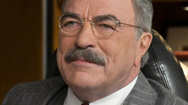Tom Selleck looking up