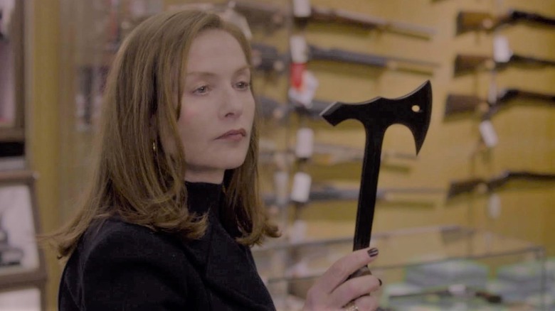 Elle holding axe