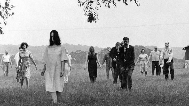 Zombies lurch towards human prey in Night of the Living Dead