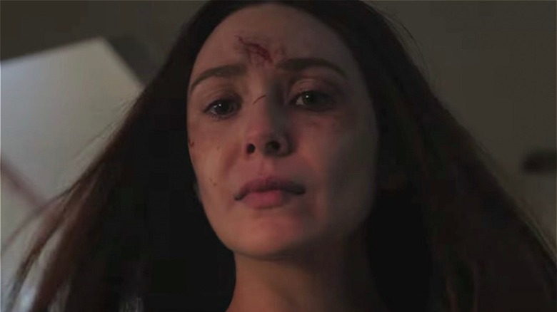 Wanda Maximoff at home with cuts on her face