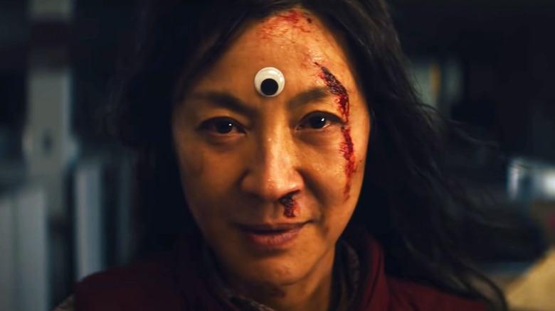 Bloodied Evelyn Wang smiling