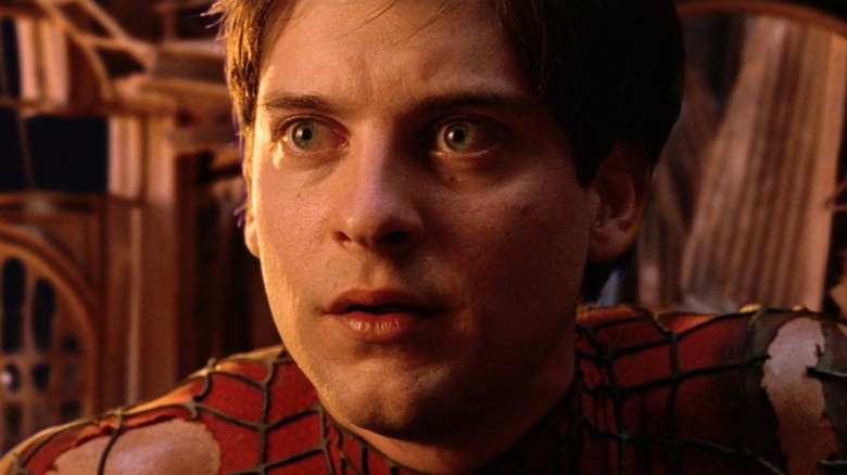 Spider-Man, unmasked and frightened, staring at Doc Ock at the end of Spider-Man 2 (2004)