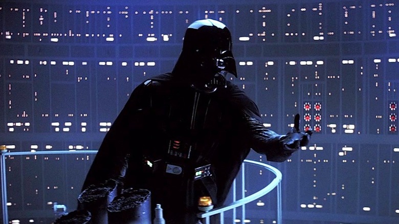 Darth Vader holding out his hand in Star Wars: The Empire Strikes Back